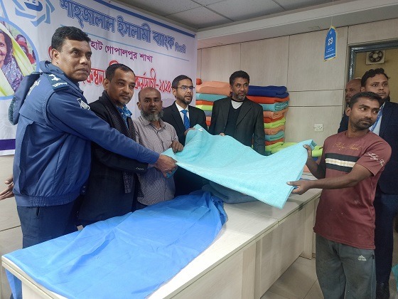 শাহ্জালাল ইসলামী ব্যাংকের উদ্যোগে শীতবস্ত্র বিতরণ
